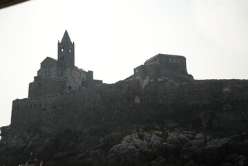 Italian church built into the cliffside village