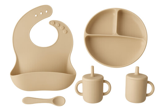 Beige baby dishes set including bib, plate, spoon, and sippy cups on transparent background