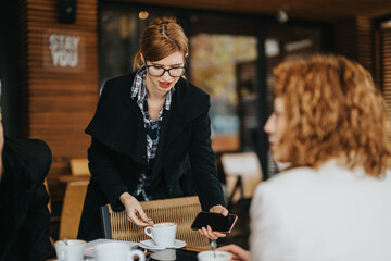 A group of people discussing ideas together in an outdoor cafe setting, emphasizing collaboration...
