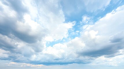 Obraz premium A stunning view of a bright sky filled with fluffy clouds, creating a peaceful and serene atmosphere perfect for nature lovers.