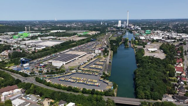Aerial view of the STEAG Heizkraftwerk Herne, cogeneration power plant, located near the Rhine Herne Canal in the industrial Ruhr area with transportation infrastructure.
