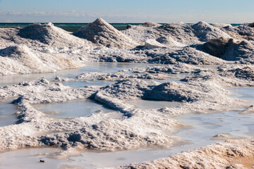A unique landscape is formed on the beach at Harrington Beach State Park, Belgium, Wisconsin from Lake Michigan with the ice volcanoes and frozen ponds in early January