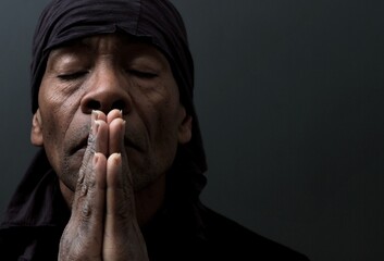 man praying to God Caribbean man praying with background stock image stock photo	