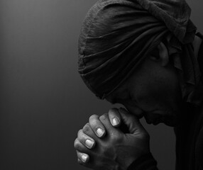 man praying to God Caribbean man praying with background stock image stock photo	