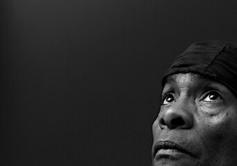 man praying to God Caribbean man praying with background stock image stock photo	
