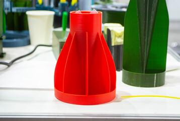 Shank stabilizer printed on 3D printer from molten plastic. Stabilization tail created on 3D printer. Prototype model of rocket bomb tip printed on 3D printer. Modern innovation 3D printing technology