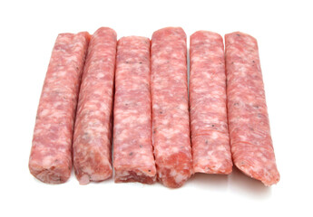 Raw meat sausages isolated on white background 