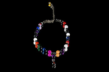 Colar esfera de pedra amarela com cordão de hematita.