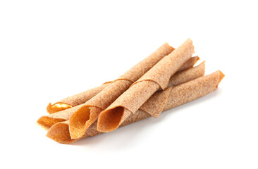 Delicious fruit leather rolls on white background