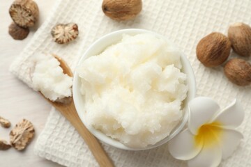 Natural shea butter on white table, flat lay