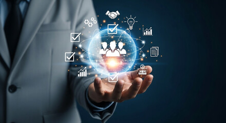 Businessperson holding a glowing globe representing teamwork and business processes with conceptual icons and technology
