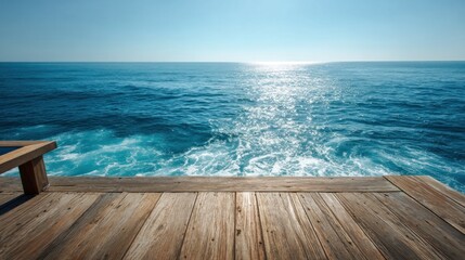 Obraz premium Sunlit ocean horizon beyond a wooden deck. Blue waves and sea spray under a clear sky. Calm momentum and fresh perspective. For travel marketing, wellness branding, and website banners.