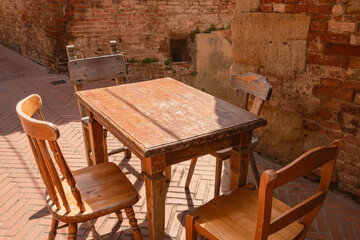 A Vintage Table And Four Chairs