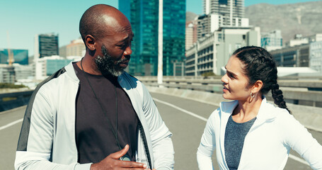 Talking, fitness and personal trainer with people in city for workout, discussion and client...