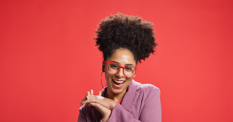 Excited, woman and smile with glasses, portrait or fashion designer with pride or studio background. Confident, stylist and African person with opportunity for startup, mockup space and eyewear