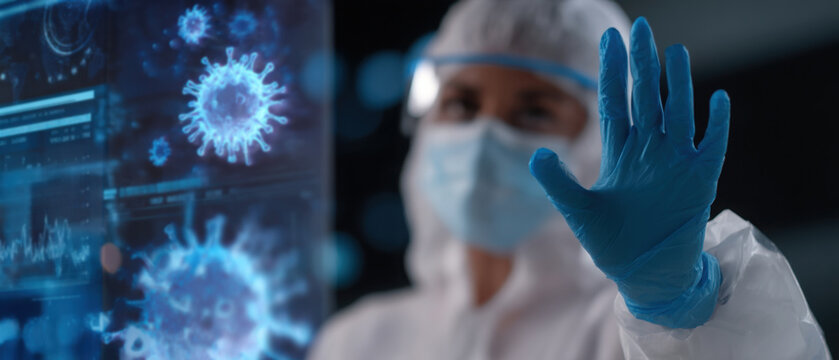 Medical professional in protective gear analyzes virus data on high-tech screen in advanced healthcare setting. concept stop virus, flu, vaccine