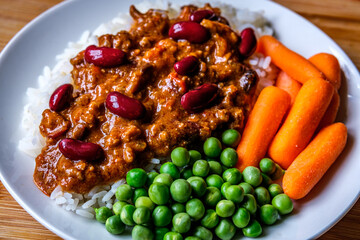 Mexican Style Chilli Con Carne With Carrots And Garden Peas