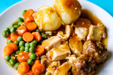 Traditional British Favourite Roast Chicken Sunday Meal With Vegetables And Stuffing
