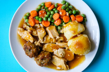 Traditional British Favourite Roast Chicken Sunday Meal With Vegetables And Stuffing