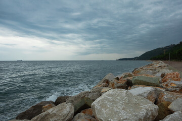 Large Boulders of Sea Embankmen in a Rainy Day