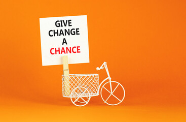 Give change a chance symbol. Concept words phrase Give change a chance on beautiful white paper on...