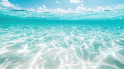 A serene underwater scene showcasing clear turquoise water, filled with gentle ripples of light, evoking feelings of tranquility and the beauty of oceanic environments.