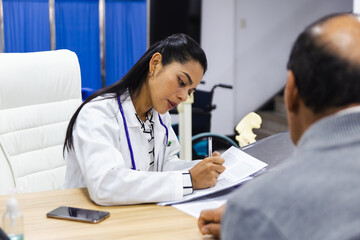 Elderly patient care by young doctor in hospital setting
