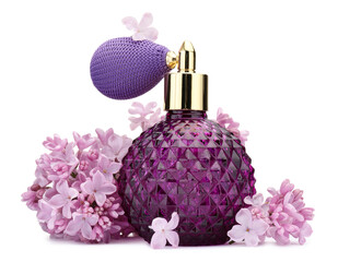Luxury perfume and beautiful lilac flowers isolated on white