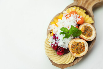 Different fresh fruits on white table, above view. Space for text