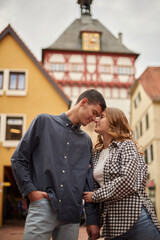 Young Cute Female Hugs Boyfriend. In Autumn Outdoor. Lovers Walking in Park. Attractive Funny Couple. Lovestory in Forest. Man and Woman. Cute Lovers in the Park. Family Concept. Happy Couple.