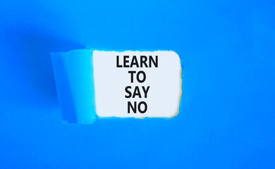 Learn to say no symbol. Concept words phrase Learn to say no on beautiful white paper. Beautiful blue paper background. Business psychological Learn to say no concept. Copy space.