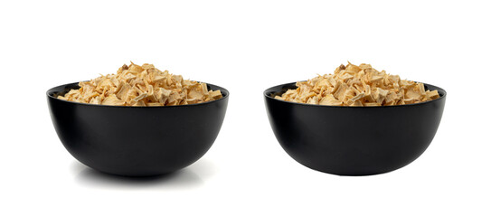 Dry parsley root, dried diced celery cubes, scattered small liquorice pileces, dry vegetable