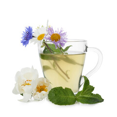 Aromatic herbal tea in glass cup, mint and flowers isolated on white