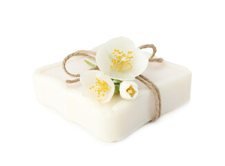 Soap bar and jasmine flowers isolated on white