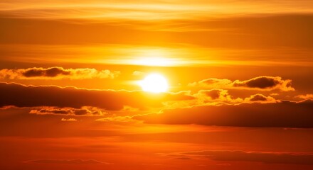 Obraz premium Fiery Sunset: A Celestial Display of Orange Hues and Clouds