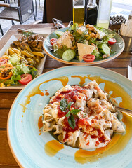 Traditional Turkish Dishes Served at Outdoor Café Table