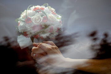 Woman Holding Bouquet of White and Pink Roses
