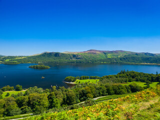 View of Derwentwater from Skellgill Bank, with heather-covered Bleaberry Fell in the distance (Keswick, Lake District, England, United Kingdom)