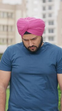 Vertical Video of Sikh Indian Man Feeling Guilty