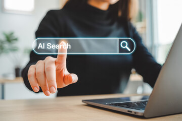 A person interacts with an AI-powered search interface, shown on a digital screen. The finger points at the search bar, implying cutting-edge technology and innovation in online data retrieval.