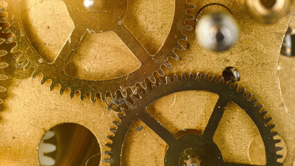 Close-up of the mechanism of an old wristwatch, symbolizing time and its transience, dirty metal and dust