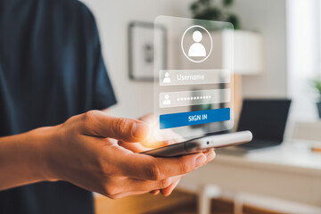 Person holding a smartphone with a futuristic, transparent login interface displayed, highlighting username and password fields. This tech image symbolizes digital security and user authentication.