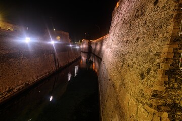 Panoramic view of Ceuta's Royal Walls lit up at night