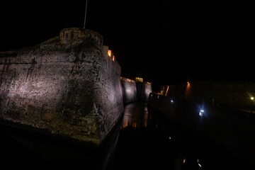Panoramic view of Ceuta's Royal Walls lit up at night