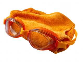 Vibrant Orange Swimming Goggles and Matching Towel Ready for the Pool