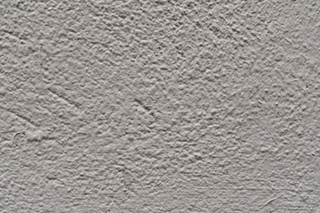 Close-up texture of white stucco wall surface