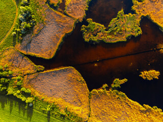 Tihany in Hungary. Benedictine Monastery of Tihany Abbey with Lake Balaton. Kulso-to Lake. Beach textures with boats with reeds and piers