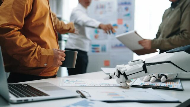 A dynamic work environment showcases synergy between a human consultant and AI, leveraging real time insights for future facing business decisions and research. Noogenesis AI