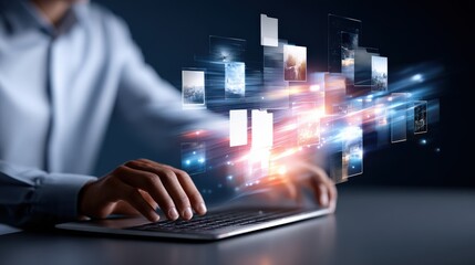 Person Typing on Laptop With Floating Digital Media Projections