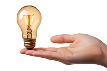 Hand offering a glowing, vintage lightbulb on black